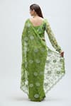 Shop_Nakita Singh_Green Net Embroidered Sequin Leaf Neck Saree With Blouse _at_Aza_Fashions