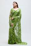 Nakita Singh_Green Net Embroidered Sequin Leaf Neck Saree With Blouse _Online_at_Aza_Fashions