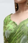 Nakita Singh_Green Net Embroidered Sequin Leaf Neck Saree With Blouse _at_Aza_Fashions