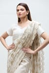 Nakita Singh_Off White Chanderi Embroidered Sequin Leaf Neck Zari Saree With Blouse _Online_at_Aza_Fashions