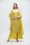 Buy_Nakita Singh_Yellow Silk Embroidered Floral Round Gota Straight Kurta Set _at_Aza_Fashions