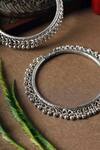 Shop_Mero Jewellery_Silver Plated Gota Patti Ghunghroo Carved Round Leg Kada-Set of 2 _at_Aza_Fashions