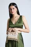 Buy_Tasna_Peach Sequin Flora Embroidered Sling Bag _at_Aza_Fashions