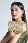 Buy_Tasna_Gold Pearls Lustrous And Cutdana Embellished Sling Bag _at_Aza_Fashions