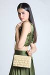 Tasna_Gold Pearl Drop Tassel Embellished Sling Bag _at_Aza_Fashions