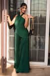 Label Anshu Khathuria_Green Satin Blend Asymmetric Draped Neck Flared Jumpsuit _at_Aza_Fashions