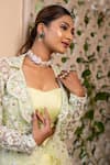 Shop_Label Anshu Khathuria_Green Net Embroidered Pearls Bralette Sweetheart Skirt Set With Jacket _at_Aza_Fashions