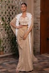 Buy_Label Anshu Khathuria_Gold Crushed Lycra Embroidered Floral Slit Sleeve Cape With Draped Skirt Set _at_Aza_Fashions