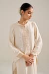 Siyona by Ankurita_Ivory Satin Hand Embroidery Sequin Collar Sundari Neck Kurta Set _at_Aza_Fashions