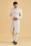 Buy_Arihant Rai Sinha_Cream Brocade, Polyester Embroidery Star Pattern Sherwani With Churidar_at_Aza_Fashions