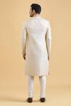 Shop_Arihant Rai Sinha_Cream Brocade, Polyester Embroidery Star Pattern Sherwani With Churidar_at_Aza_Fashions