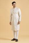 Arihant Rai Sinha_Cream Brocade, Polyester Embroidery Star Pattern Sherwani With Churidar_at_Aza_Fashions