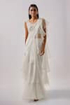 Buy_Blue Lotus Design_Ivory Net Embroidered Floral V-neck Plain Pre Draped Ruffle Saree With Blouse _at_Aza_Fashions