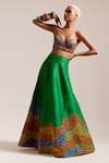 Buy_MINI SONDHI_Green Raw Silk Embroidered Thread Flowering Garden Lehenga With Tube Bralette _at_Aza_Fashions