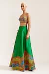 MINI SONDHI_Green Raw Silk Embroidered Thread Flowering Garden Lehenga With Tube Bralette _Online_at_Aza_Fashions