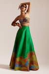 Shop_MINI SONDHI_Green Raw Silk Embroidered Thread Flowering Garden Lehenga With Tube Bralette _Online_at_Aza_Fashions