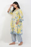 Devyani Mehrotra_Yellow Viscose Muslin Printed Floral Keyhole Flirty Pleats Tunic And Pant Set _at_Aza_Fashions