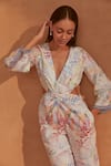 NOIB_White Linen Lyocell Printed Butterfly Deep V Neck Ella Effect Jumpsuit _Online_at_Aza_Fashions