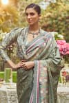 Kasturi Kundal_Green Pure Silk Woven Jane Eyre Handloom Saree With Unstitched Blouse Piece _at_Aza_Fashions