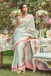 Buy_Kasturi Kundal_Green Pure Silk Woven Estella Zari Handloom Saree With Unstitched Blouse Piece _at_Aza_Fashions