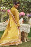 Shop_Kasturi Kundal_Yellow Pure Silk Woven Butedaar Estella Zari Saree With Unstitched Blouse Piece _at_Aza_Fashions