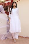 Shop_Bannhi_White Kurta And Palazzo Taffeta Silk Hand Painted Floral Plain Solid Set _Online_at_Aza_Fashions