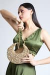 Tasna_Gold Cutdana Glimmering Crescent Handbag _at_Aza_Fashions