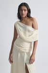 Shop_Deme by Gabriella_Off White Crepe Solid Asymmetric Neck Gemma Draped Flowy Gown _at_Aza_Fashions