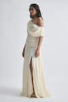 Shop_Deme by Gabriella_Off White Crepe Solid Asymmetric Neck Gemma Draped Flowy Gown _Online_at_Aza_Fashions