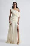 Buy_Deme by Gabriella_Off White Crepe Solid Asymmetric Neck Gemma Draped Flowy Gown _at_Aza_Fashions