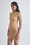 Shop_Deme by Gabriella_Beige Malai Lycra Solid Asymmetric Neck Amadea Ruched Short Dress _at_Aza_Fashions