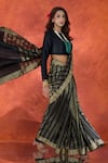 Samyukta Singhania_Black Pure Viscose Weave Stripe Handwoven Saree With Running Blouse _at_Aza_Fashions