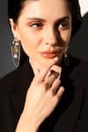 Shop_Shazé_Gold Plated Stone Ingress Floral Carved Cutwork Earrings _Online_at_Aza_Fashions