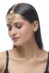 Just Shradha's_Gold Plated Stone Crescent Moon Carved Maangtikka _at_Aza_Fashions