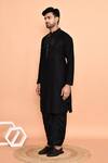 Arihant Rai Sinha_Black Kurta Silk Embroidered Yoke Metallic Stripe With Dhoti Pant _at_Aza_Fashions