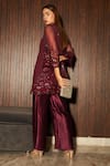 Shop_Tasuvure_Maroon Net Embroidered Notched Sarah Floral Work Tunic And Pant Set _at_Aza_Fashions