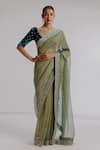 Buy_Taisha_Green Saree Pure Zari Crushed Tissue Textured Set With Velvet Silk Blouse _at_Aza_Fashions