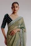 Shop_Taisha_Green Saree Pure Zari Crushed Tissue Textured Set With Velvet Silk Blouse _Online_at_Aza_Fashions