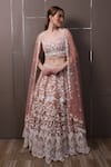 Buy_Sayisha_Peach Net Sequins, Embroidery Sweetheart Neck Hand Blouse Lehenga Set _at_Aza_Fashions
