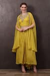 Buy_SAYISHA_Yellow Muslin Hand Embroidered Crystals Round Blouse With Pleated Skirt _at_Aza_Fashions