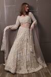 Shop_SAYISHA_Off White Organza Hand Embroidered Sequins Sweetheart Floral Lehenga Set _at_Aza_Fashions