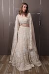 Buy_SAYISHA_Off White Organza Hand Embroidered Sequins Sweetheart Floral Lehenga Set _Online_at_Aza_Fashions