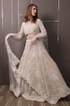 SAYISHA_Off White Organza Hand Embroidered Sequins Sweetheart Floral Lehenga Set _at_Aza_Fashions