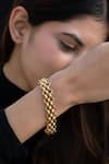 Do Taara_Gold Plated Interwoven Loop Bracelet _Online_at_Aza_Fashions