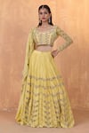 Buy_RADHA SHARMA_Yellow Silk Chanderi Embroidery Pearl Round Neck Gul Sequin Lehenga Set _at_Aza_Fashions