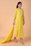 Nidhi Kejriwal_Yellow Chanderi, Denim Embroidery, Cut Work Round Neck Floral Kurta Pant Set _at_Aza_Fashions