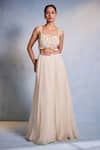 Buy_Muditaa By Urmila_Off White Organza Hand Embroidery Shell Tassel Shankha Blouse With Lehenga _at_Aza_Fashions