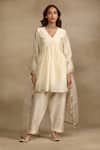 Buy_Trendy tokari_Ivory Silk Chanderi Placement Embroidery Cutdana V Neck Flared Kurta Pant Set _at_Aza_Fashions