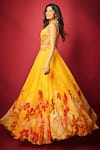 Shop_Mandira Wirk_Yellow Chiffon Printed Orchid Plunging Cutout Maxi Dress _at_Aza_Fashions