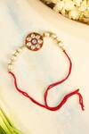 Buy_Shlok Jewels_Orange Crystals Kundan Floral Rakhi _at_Aza_Fashions
